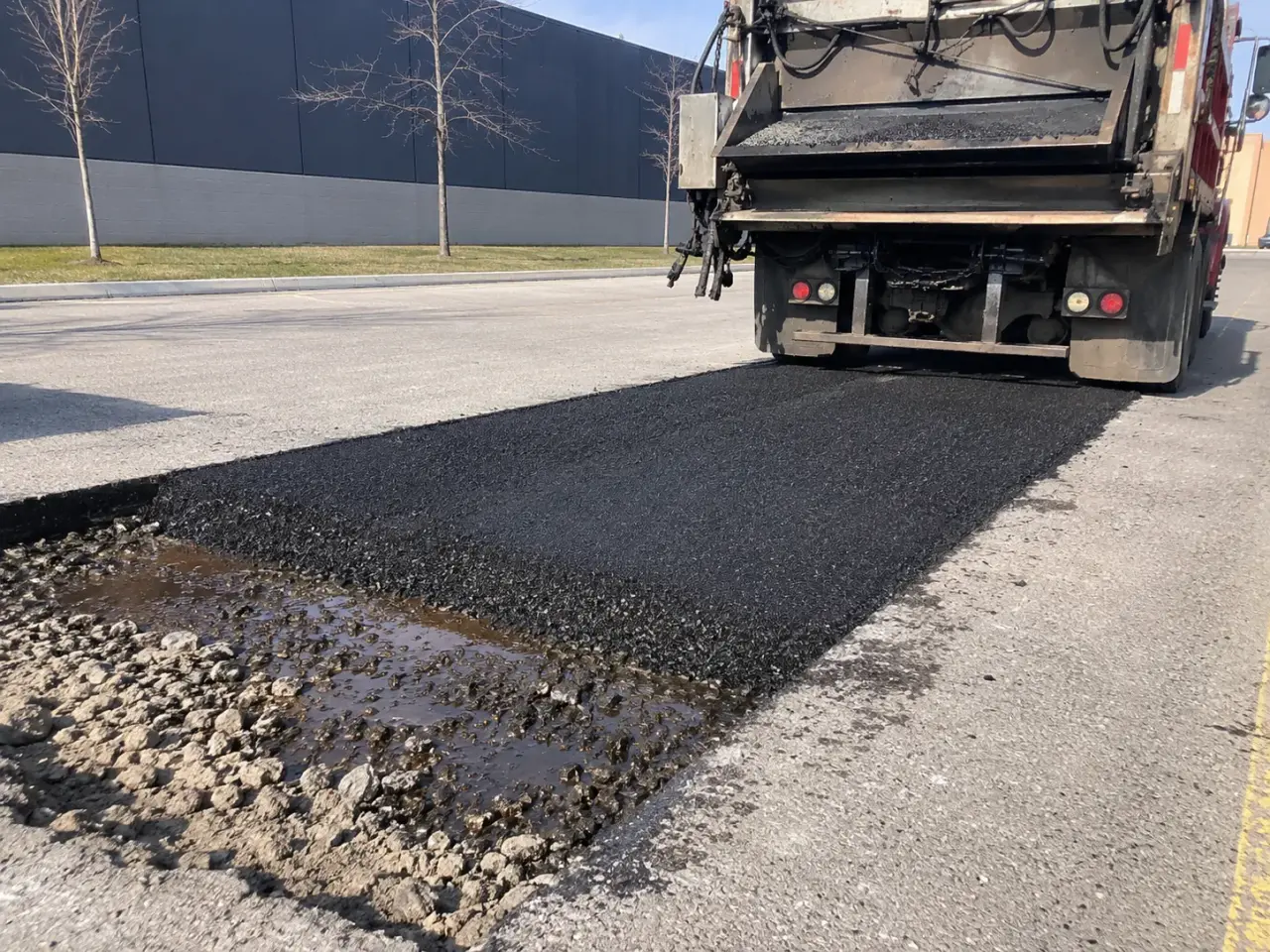 How we complete asphalt repair and patching by Harrowgate Group