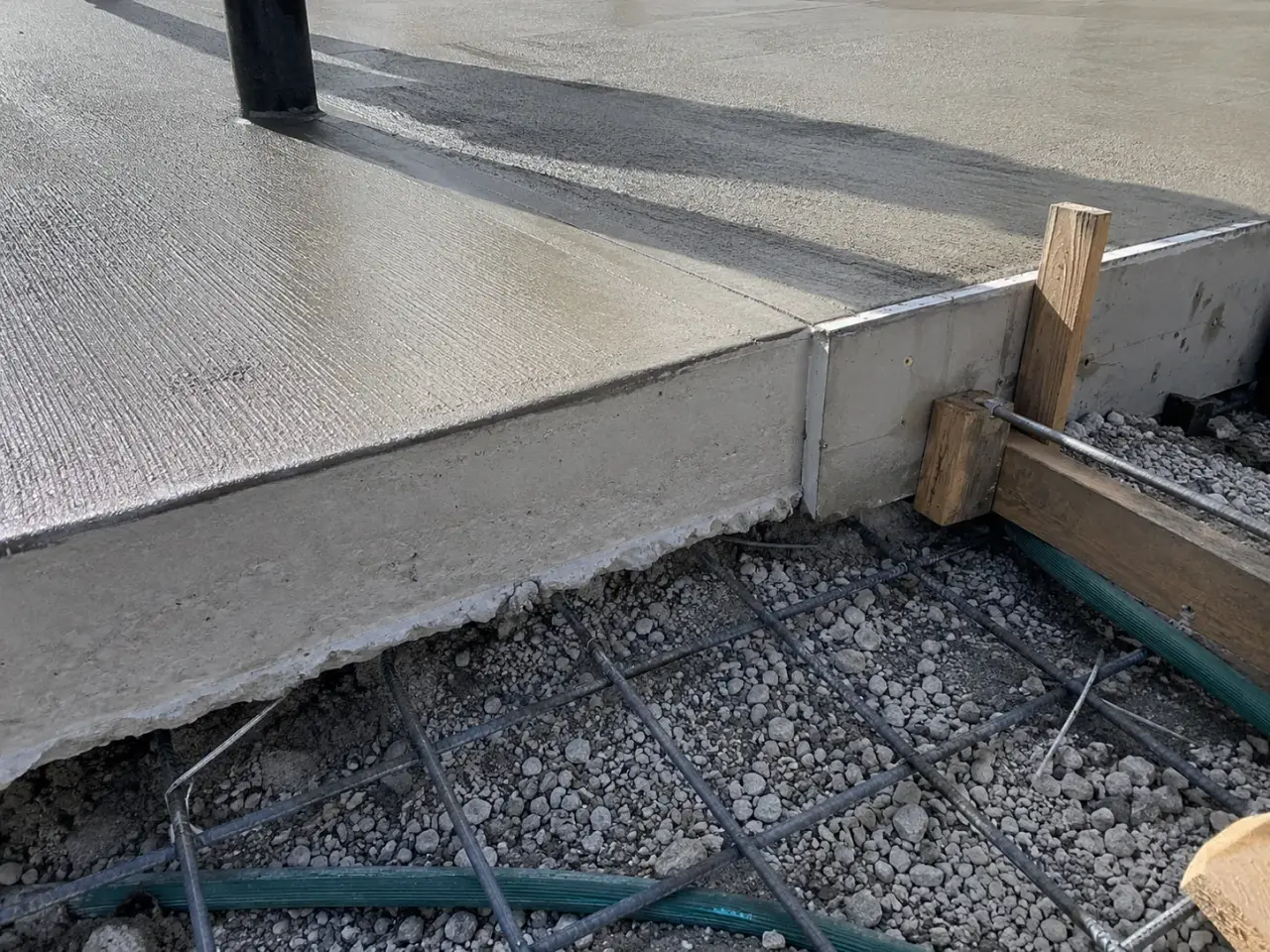 Commercial Concrete Patios and Landings in Aurora being built and completed on site by Harrowgate Group