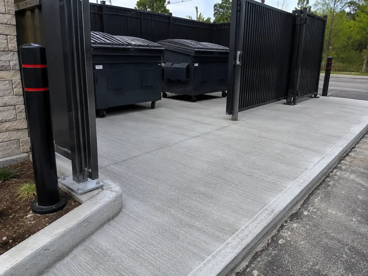 Dumpster and Enclosure Pads in Pickering being built and completed on site by Harrowgate Group