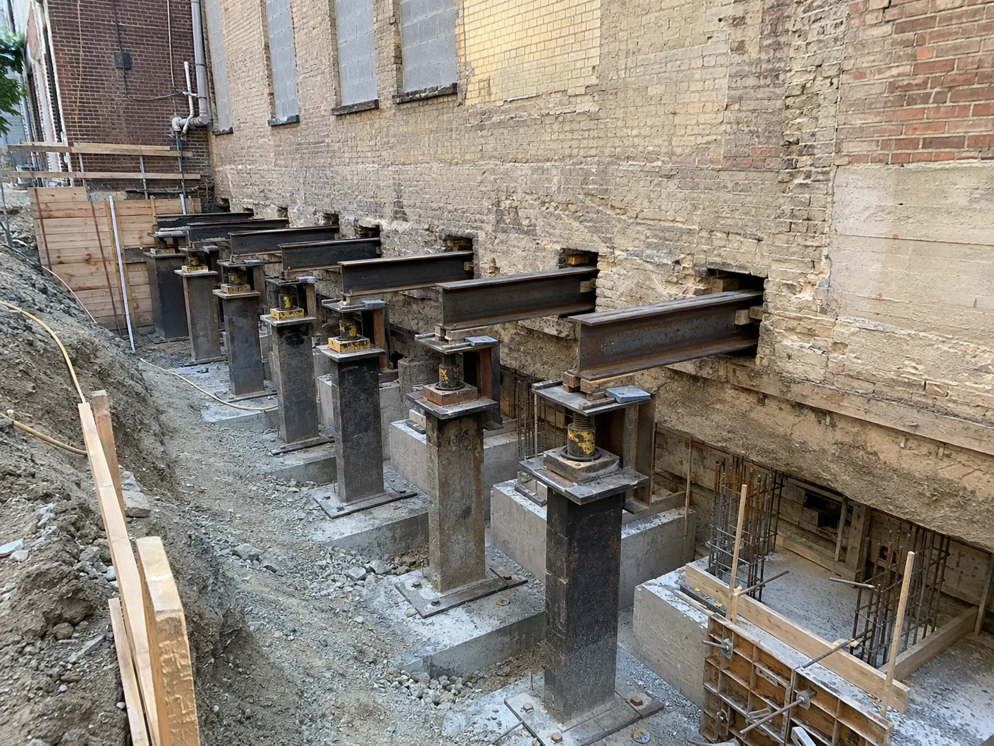 Needle Beam Underpinning across Aurora property by Harrowgate Group