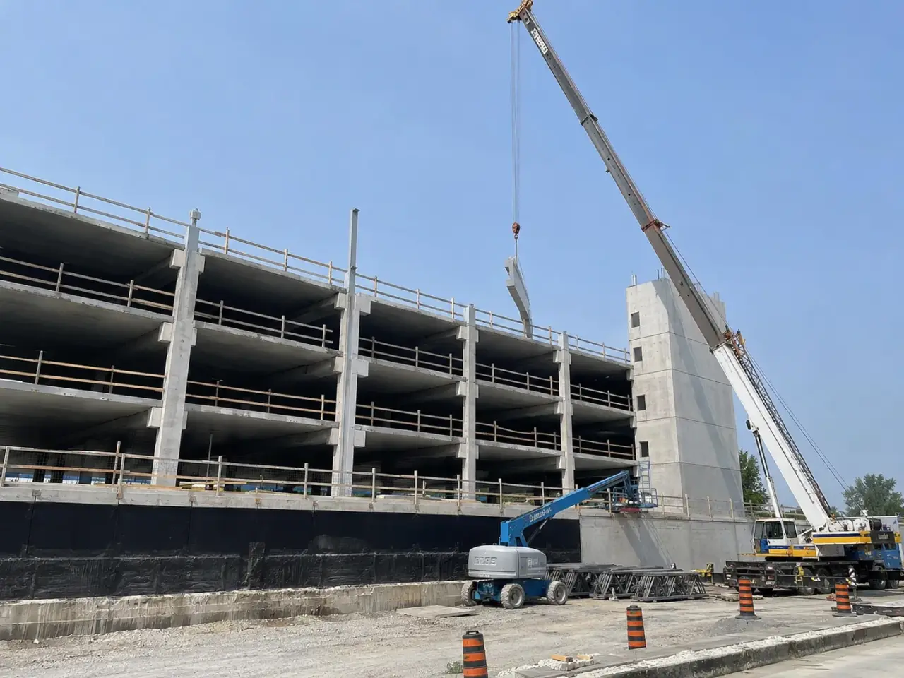 Which parking-structure system fits the site and operation? by Harrowgate Group