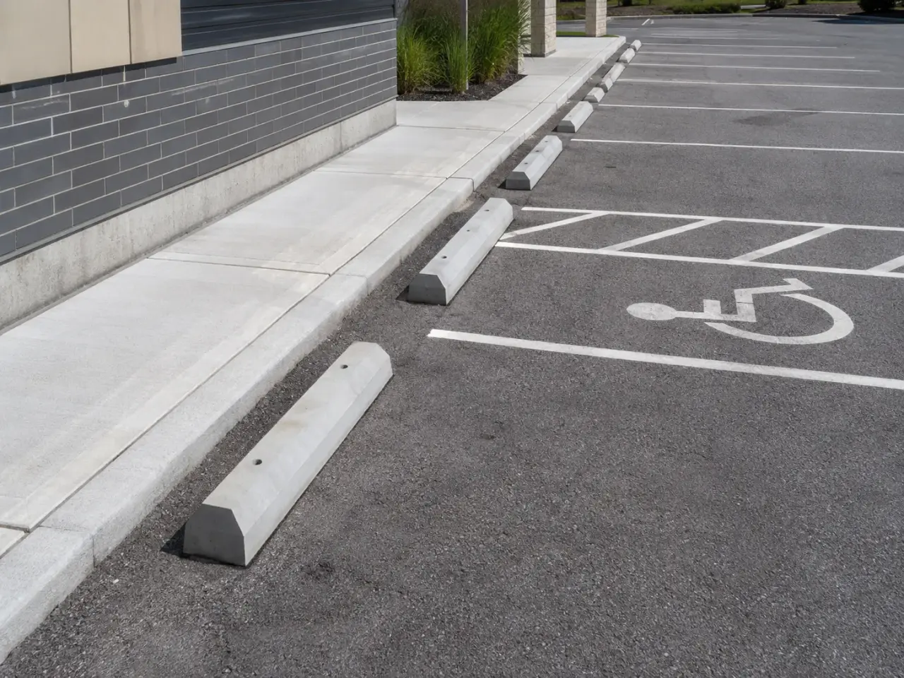 Which wheel stops and parking curbs method fits the condition? by Harrowgate Group